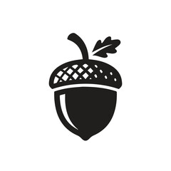 Black acorn silhouette icon with detailed leaf silhouette botanical woodland © Saharima