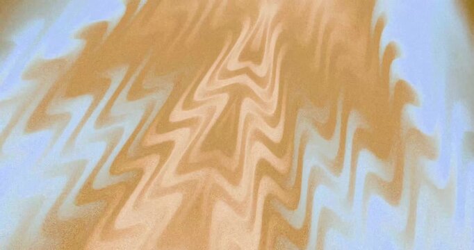 Abstract warm pastel orange and beige gradient background with soft wavy pattern