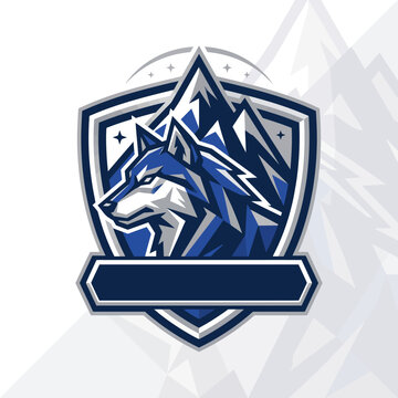 Dynamic blue wolf esports mascot emblem featuring a powerful geometric animal head design with sharp mountain peaks, ideal for a strong gaming team or modern brand identity