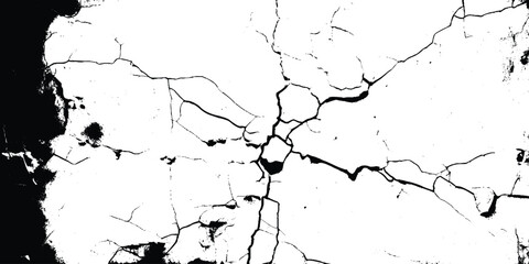 A wall with cracks and holes in it. The wall is white and the cracks are visible. The wall appears to be old and worn down © Just Choice