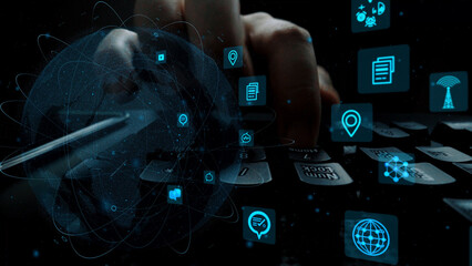 A striking close-up of hands typing on a keyboard against a dark background adorned with floating...