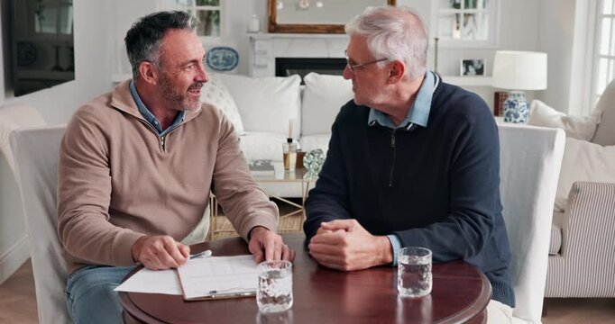 Senior, man and handshake with financial advisor in home for retirement plan, arrangement or deal. Elderly, person or shaking hands with mature accountant for pension fund application or agreement