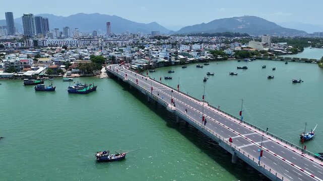 Aerial view of Cau Xom Bong bridge across Cai river in Nha Trang city, Vietnam.