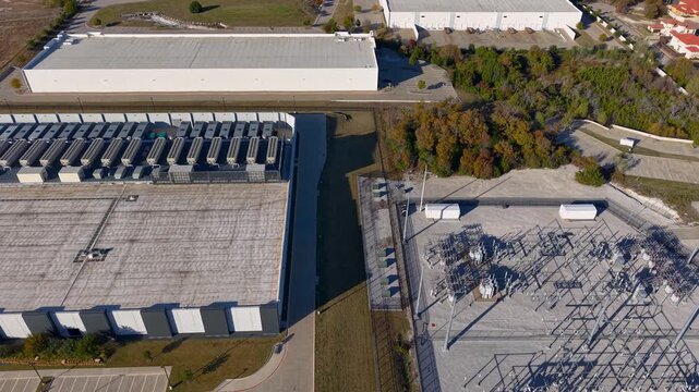 Aerial view of a data center and electrical power substation