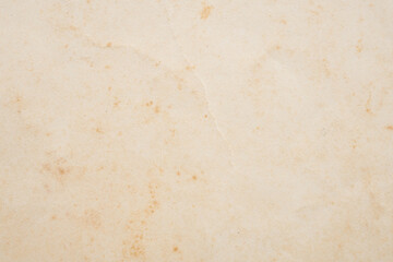 Fototapeta na wymiar Old vintage paper texture background with aged stains and antique yellowed parchment effect
