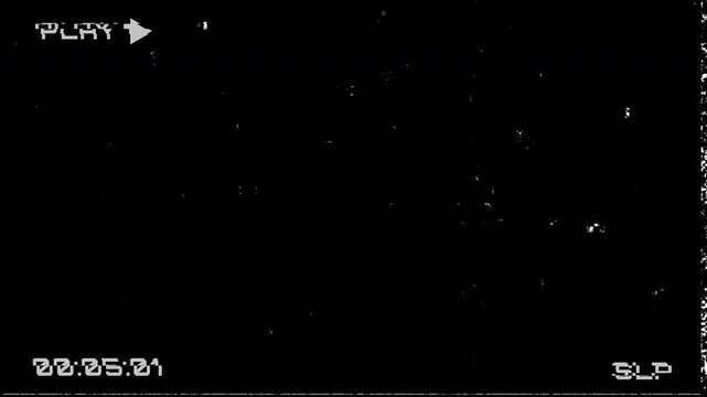 Damaged VHS tape playing with static and timecode