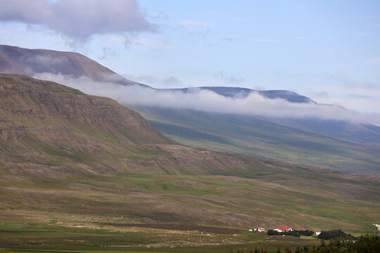 Bank of fog in a valley in the landscape of the Tr&ouml;llaskagi Peninsula, Eyjafj&ouml;rdur, Iceland