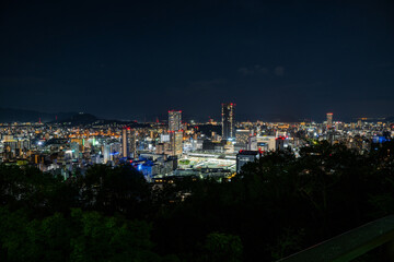 Fototapeta premium Beautiful Night View of Hiroshima Station Area from Futabayama with a Sparkling Urban Panorama