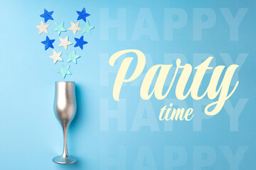 Obraz premium Celebrating a happy birthday with stars and a silver glass on a blue background