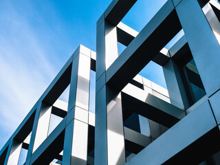 Naklejka premium Architecture details Building structure Metal columns Low angle view Blue sky background