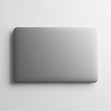 Sleek Silver Laptop Closed on White Background Minimalist Design.
