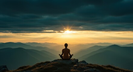 Obraz premium Dramatic sunset sky above a silhouette person meditating on a mountain peak for yoga retreat advertising, mindfulness brand banner and spiritual wellness concepts