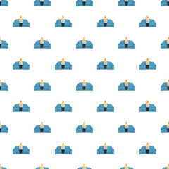 Fototapeta premium Senior woman sitting on a sofa using a laptop, creating a seamless background pattern