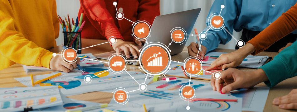 Startup company employee working together, analyzing BI dashboard paper on financial data report and planning strategic marketing for business success in panorama banner. Synergic Amity