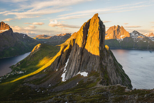 Segla mountain illuminated by golden hour light, Senja, Norway