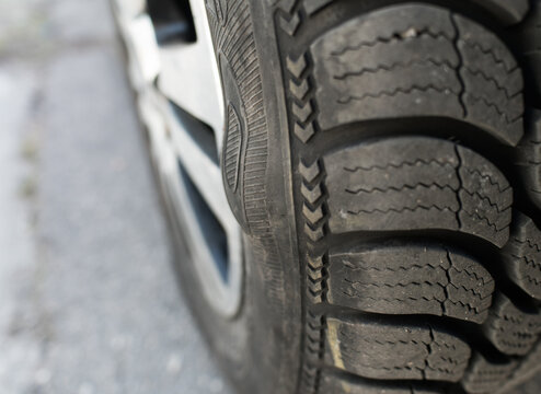 Bubbled tire sidewall indicating internal structure failure
