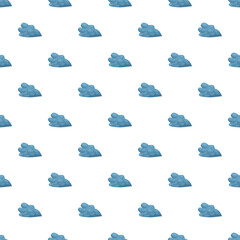 Fototapeta premium Cartoon blue foliage elements forming a cheerful seamless pattern on a white background