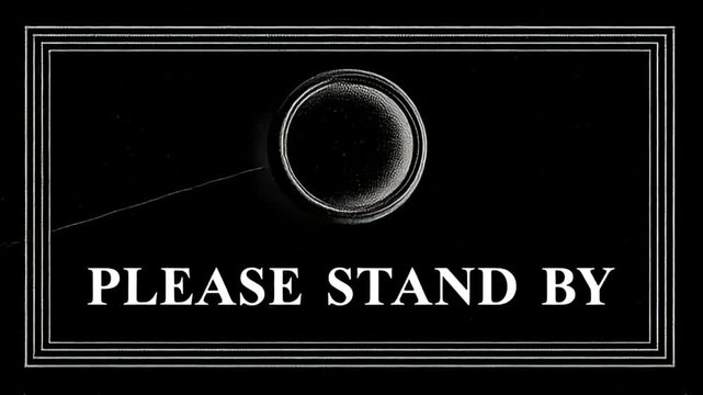 Vintage please stand by title card with retro film effects