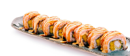 Salmon maki sushi rolls with mango on plate © AntAlexStudio