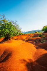 Obraz premium Red clay terrain Kokkinopilos Preveza near Preveza city, in Epirus region, Greece.