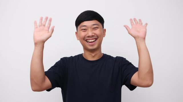 Asian man standing and show hand bye bye, Man say good bye concept