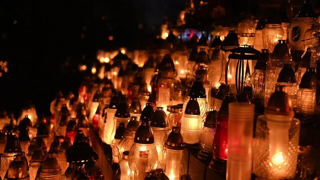 Many Candles Burning At Night In Memory Of The Deceased