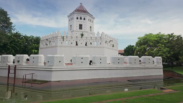The historic Phra Sumen Fort, a prominent landmark in Bangkok, Thailand, stands majestically against a cloudy sky. Built in 1783, it is a testament to the city's rich history