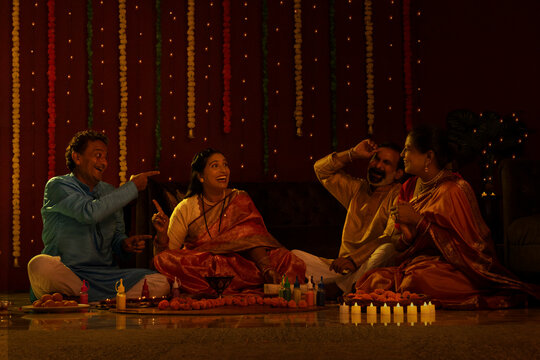 Family enjoying Diwali evening with laughter and joy