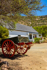 Obraz premium Old antique vintage Ox Wagon at colonial homestead