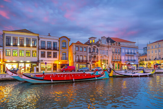 Traditional moliceiro boats moored on the central canal of Aveiro, Portugal