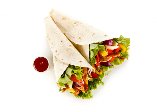 Kebab - grilled meat and vegetables on white background
