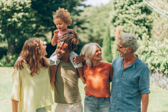 Diverse multigenerational family enjoying time together outdoors