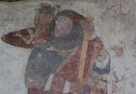 Medieval paintings of St Christopher on the walls of Breage Church Cornwall 