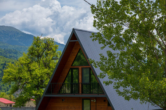 Modern A-frame cabin in the mountains