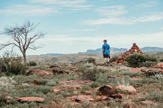 Man stands looking at the view in the Flinders ranges.