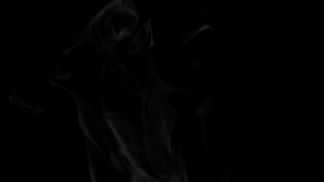 Real steam rising from boiling water against a black background. Natural water vapor movement captured in studio conditions. Not AI generated. Ideal for cooking, hot beverages, humidity, wellness, atm