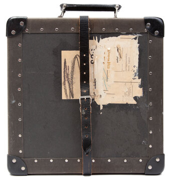 Schwarze analoge Film-Transportbox mit Etikettenresten und Leder