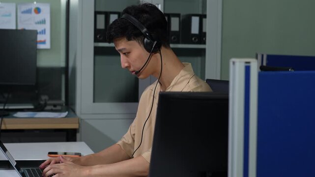 Asian businessman presenting ideas and analyzing financial charts during an online meeting.
