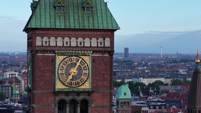 Flight over City Hall clock tower, Copenhagen city, Denmark