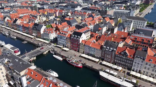 High angle view of Nyhavn canal waterfront and townhouses, Copenhagen, Denmark