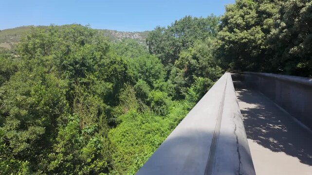 Pont du Diable scenic view of lush greenery and summer landscape