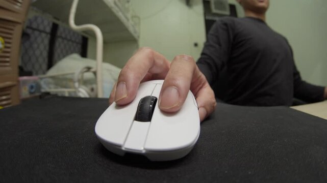 Desktop workspace featuring computer mouse in close perspective