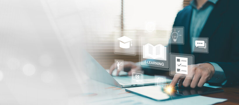 Business professional using laptop and smartphone with virtual e-learning interface, online education icons, digital training tools, knowledge management, remote learning, corporate development,