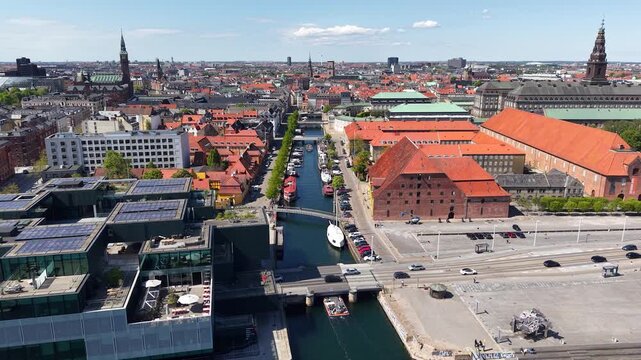 Flight over Slotsholmen island and canal, Copenhagen city, Denmark
