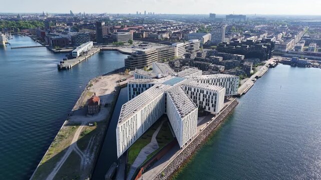 Drone shot of star-shaped UN City building in Copenhagen, Denmark