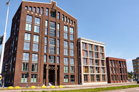 Modern housing development project de kroon in zaandam netherlands industrial style architecture with winch beam residential building cityscape warehouse style