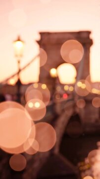 A Dreamy Sunset on a Bridge, Capturing the Soft Glow of City Lights and the Historic Architecture Framed in a Beautiful Bokeh Effect