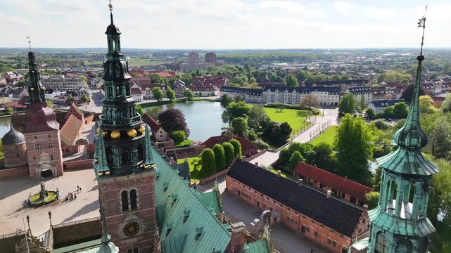 Drone shot of Frederiksborg Castle towers and courtyard, Hillerod, Denmark
