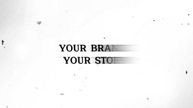 Blurry black text on white background with speckles and spots