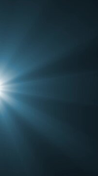 Cinematic blue optical flare with volumetric light rays shining from the left side on a dark background, seamless loop
